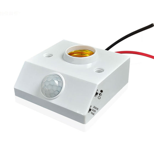 Adjustable motion sensor lamp holder with white housing and built-in PIR sensor window