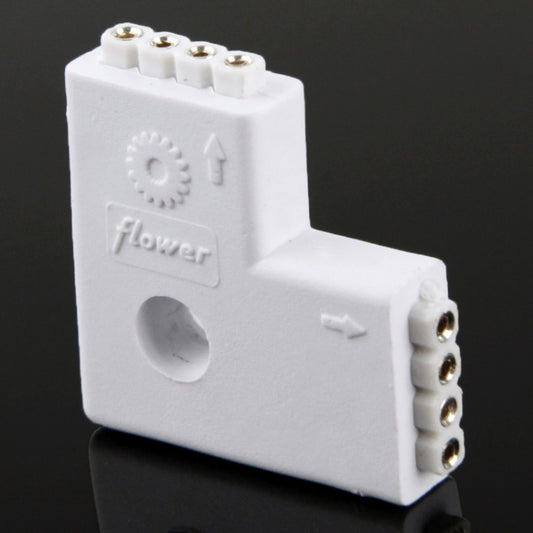 White 4-pin 2-way female connector, end view with gold contacts and notch