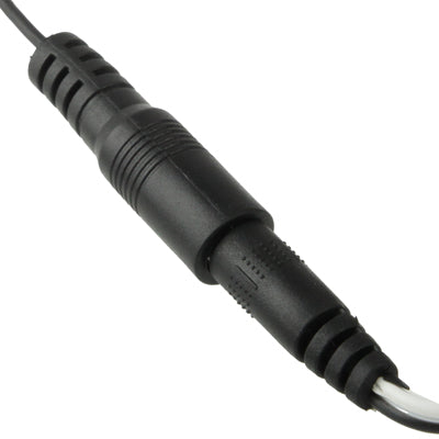 DC barrel plug end on black extension cable with strain relief