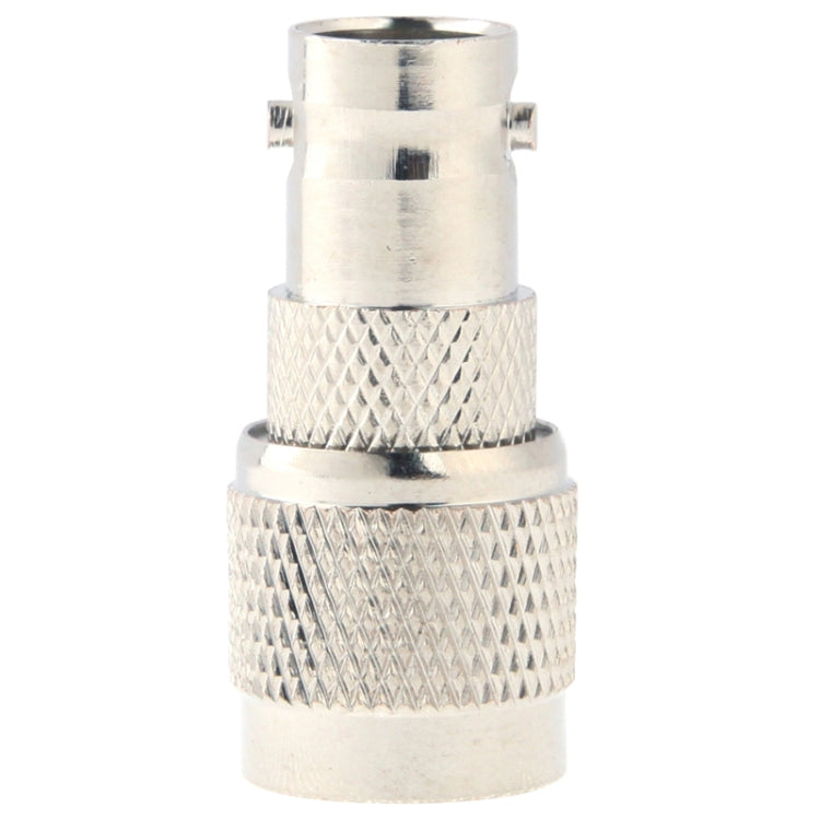 TNC end of BNC-to-TNC coax adapter with polished metal plug and grip ring
