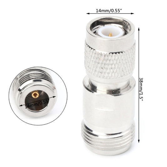 Coaxial adapter with silver metal connectors and knurled grip, size shown