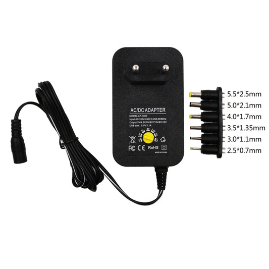 Black AC/DC power adapter with cord and printed output plug size guide