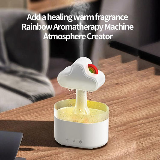 White cloud aromatherapy diffuser releasing mist with rainbow light ring