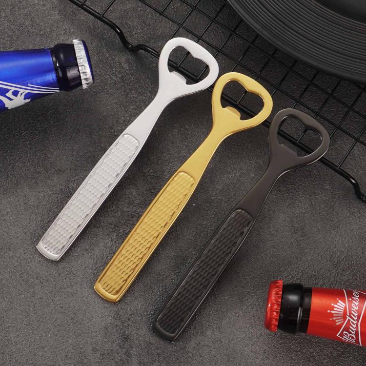 Heart-shaped wine openers with textured grips in white, gold, and black