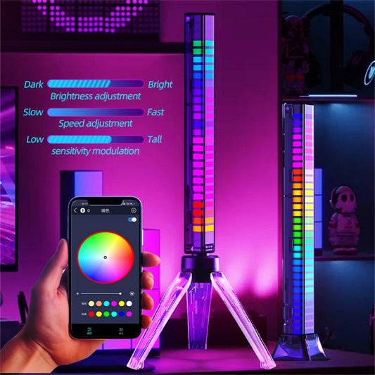 RGB music sync ambient lamp on clear tripod with vertical rainbow LED bar, phone app visible