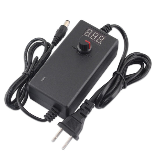 Black adjustable AC-DC power adapter with digital voltage display and red knob