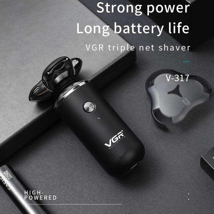 VGR electric shaver angled view with protective cap shown near the handle