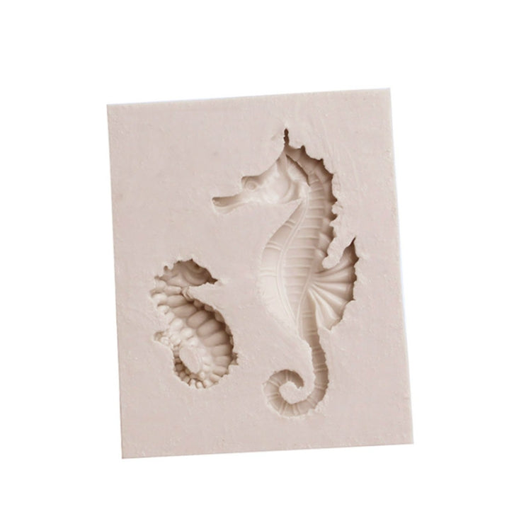 White silicone hippocampus mold with two raised sea horse cavity shapes
