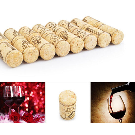 Set of synthetic cork wine stoppers, tan with engraved patterns, cylindrical