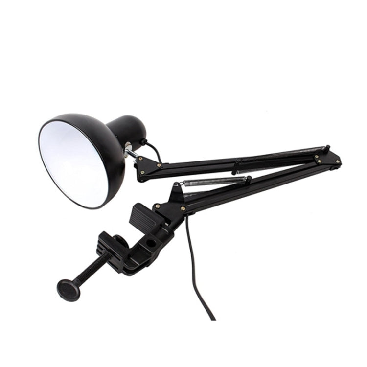 Black clamp mount swing arm lamp with round shade and power cord