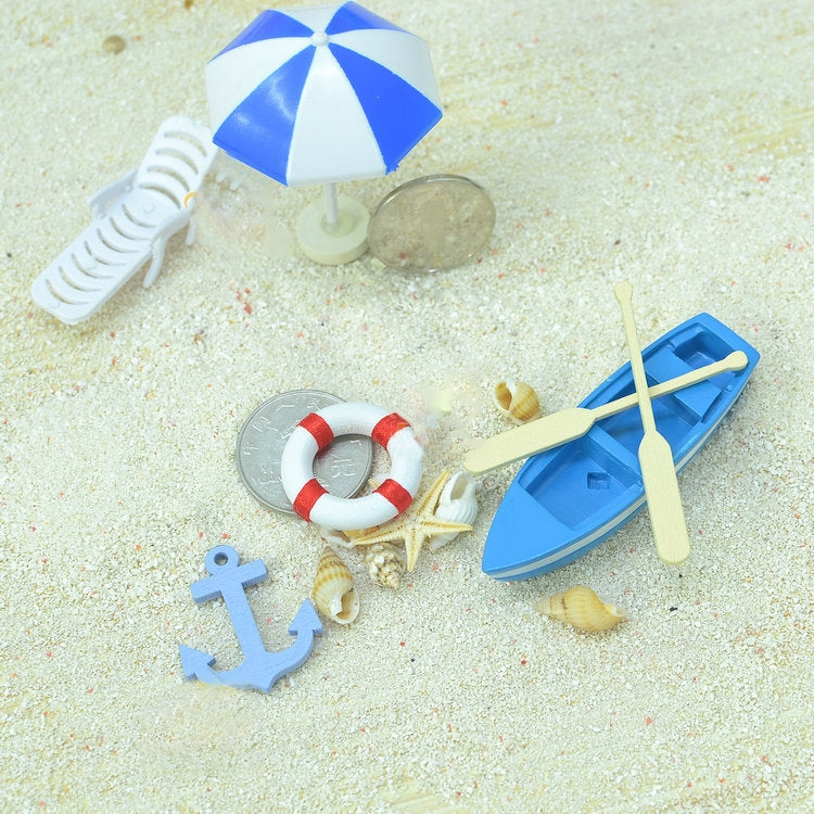 Mini beach model set with lifebuoy ring, boat, anchor, and umbrella