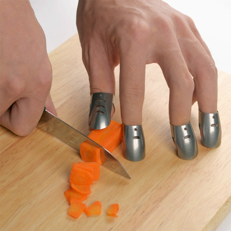 Four adjustable stainless steel finger guards worn on hand near cutting knife