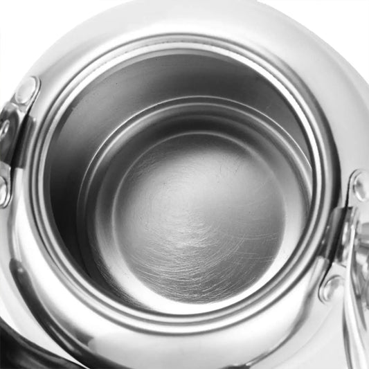Stainless steel kettle interior with smooth circular base and raised rim