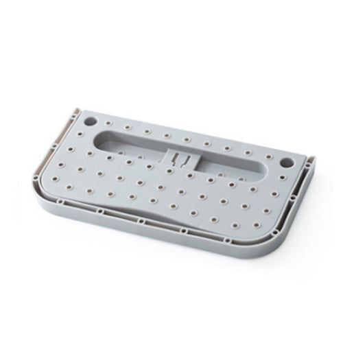 Light gray folding wall hanging slipper storage rack with suction cups and peg holes