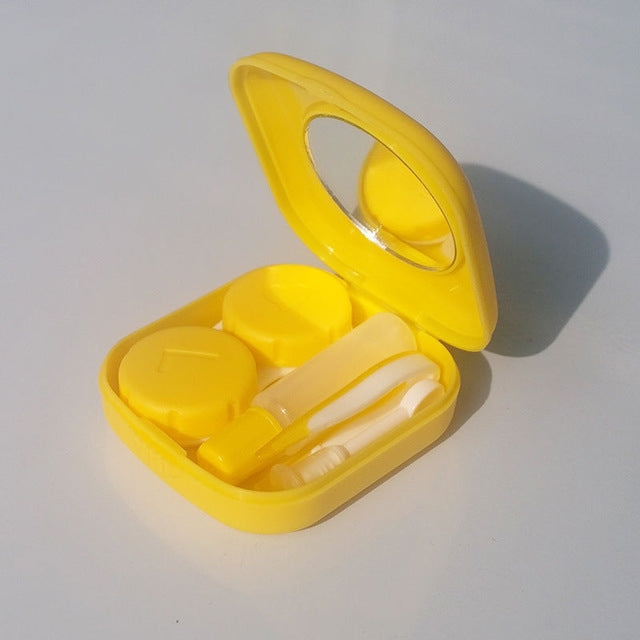 Yellow mini square contact lens case with mirror lid, two compartments, and tools