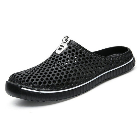 Black breathable hollow slip-on sandals with perforated upper and cushioned sole