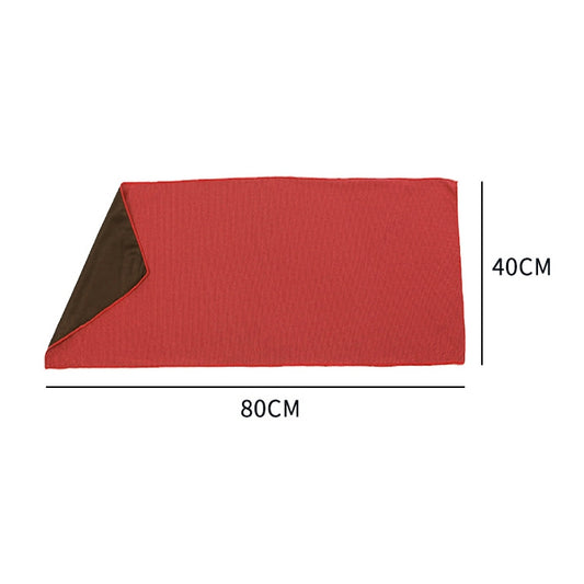 Red cold towel with stitched edge and visible size markers, folded