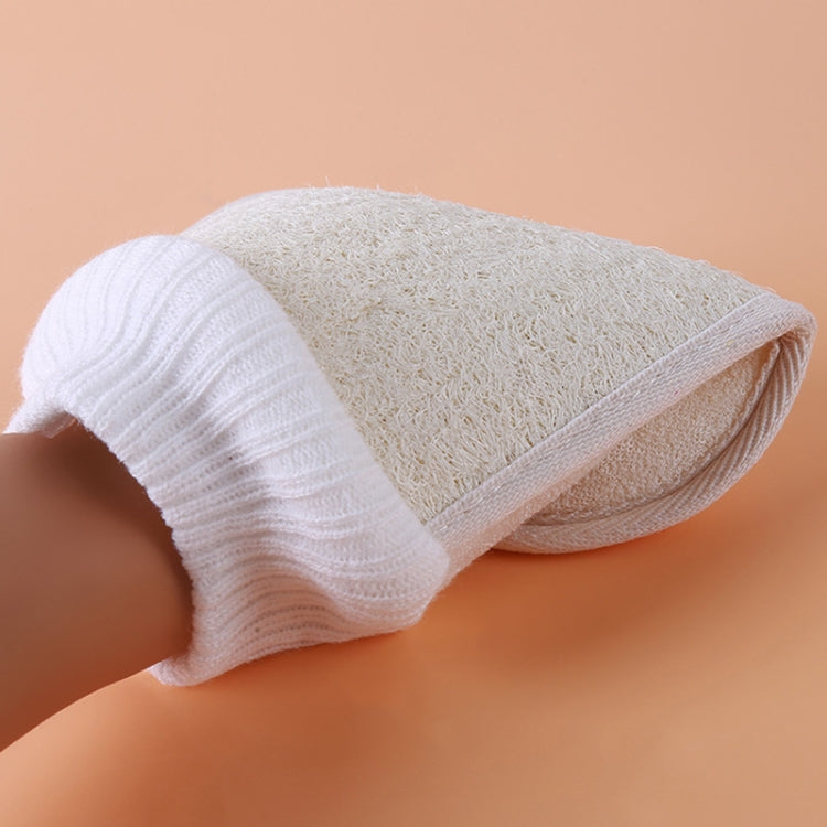 Natural loofah bath glove rolled view with ribbed white cuff and textured scrub pad