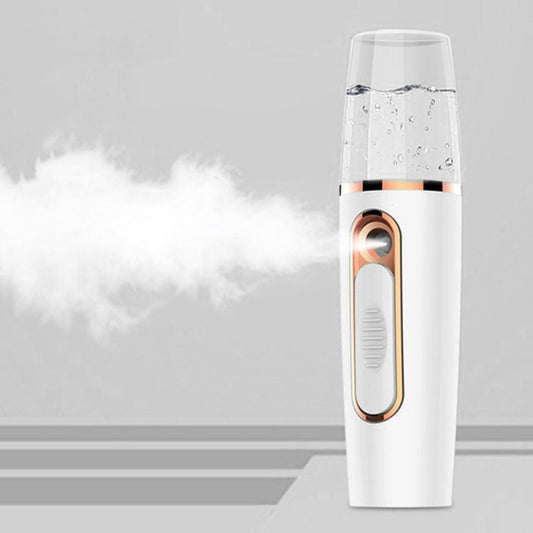 Rechargeable mini moisturizing sprayer with white body and clear mist nozzle cap