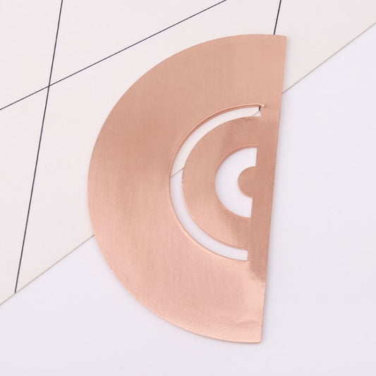 Copper metal angle protractor ruler with large semicircle cutout and markings