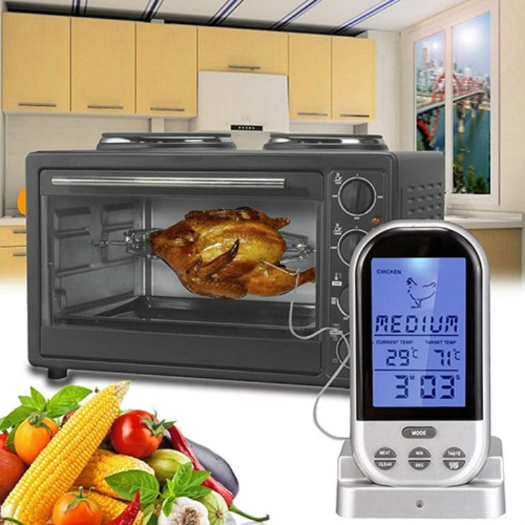 Digital meat probe thermometer on oven stand with blue LCD during roasting