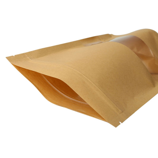Brown kraft stand-up pouch laid open, showing folded edges and top self-sealing zipper