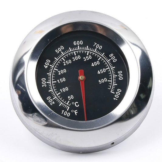 Stainless steel oven thermometer face with chrome bezel and red temperature needle