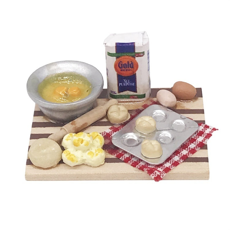 Mini wooden chopping board with toy food items, eggs, and blister tray centerpiece