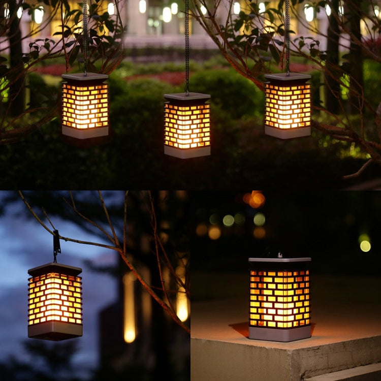 Hanging solar lanterns with warm orange LED grid glow for outdoor garden lighting