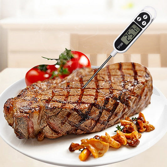 Digital food thermometer with stainless probe showing temperature on LCD display