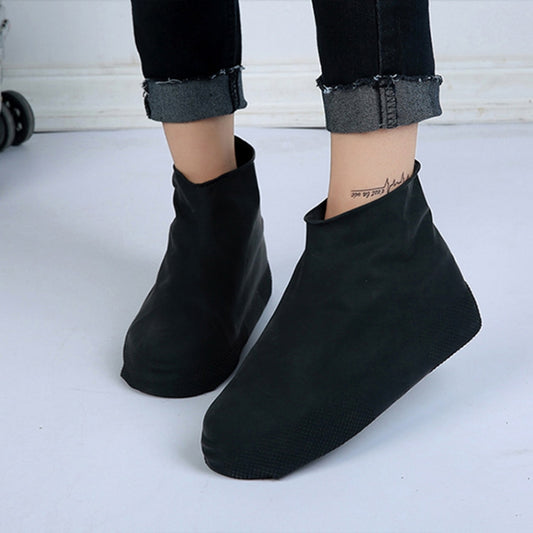 Black waterproof short-tube shoe covers with textured sole and elastic top