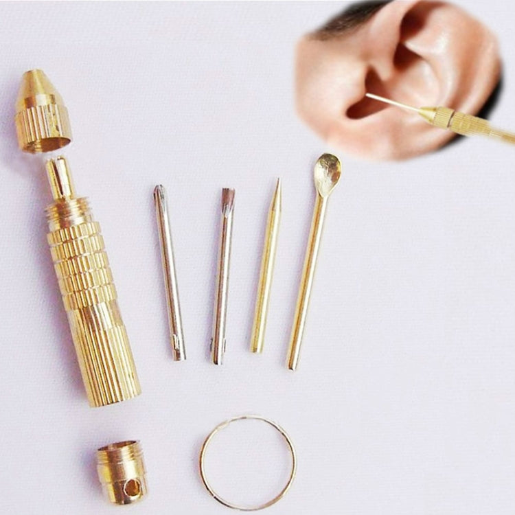 Portable ear spoon tool set including multiple tips, gold metal case, and ring