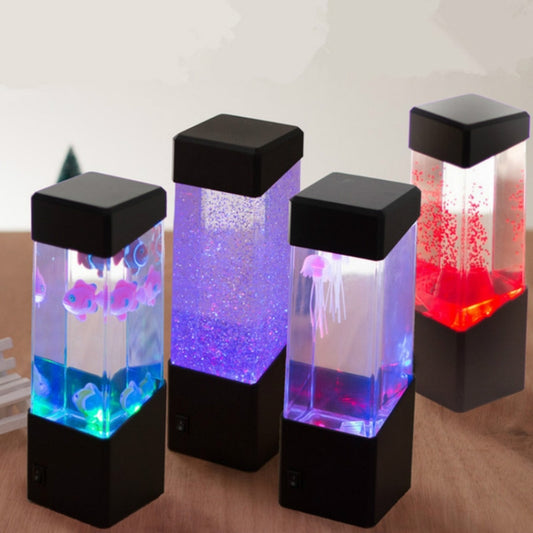Set of LED jellyfish night lights in black housings, glowing purple, blue, and red