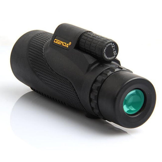 Black high-power monocular telescope with textured grip and green objective lens