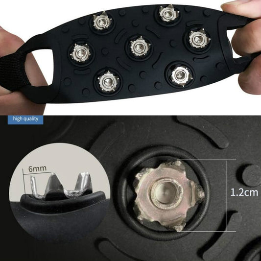 Stainless metal spike traction plate on black silicone shoe cover with multiple teeth