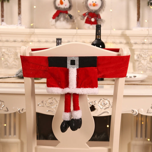 Red Santa-style chair cover with black belt and white plush trim, hanging legs