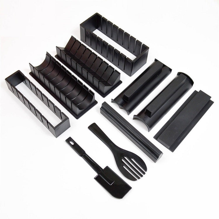 Assorted black sushi rice ball molds with rectangular inserts and utensils for shaping