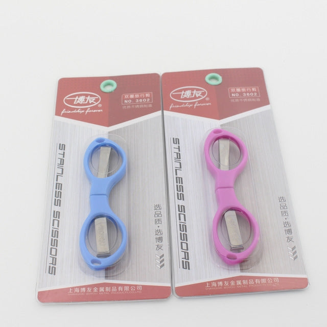 Package of foldable mini scissors: blue and pink handle models with stainless blades