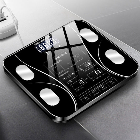 Black digital bathroom weighing scale with large LCD display and four corner electrodes