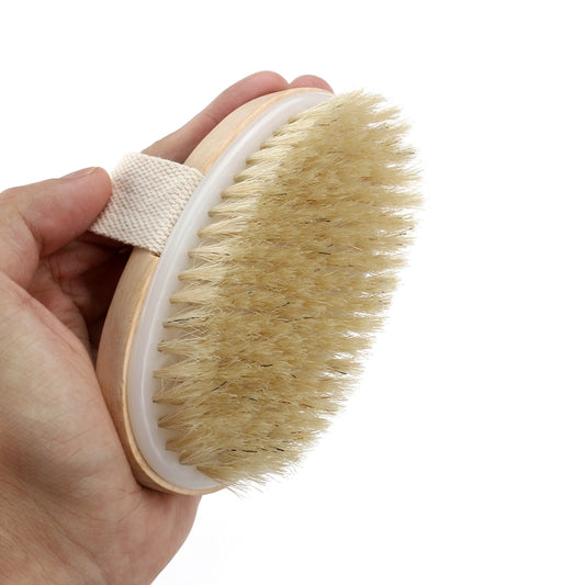 Round wooden body brush with soft natural bristles and beige fabric strap, handle-free