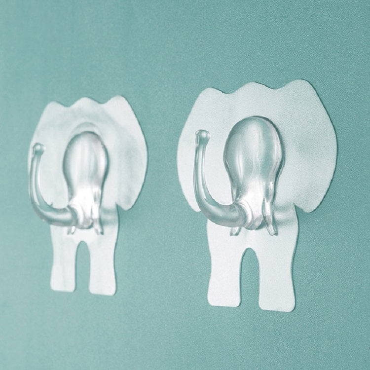 Two transparent elephant waterproof wall hooks shown side by side on a wall