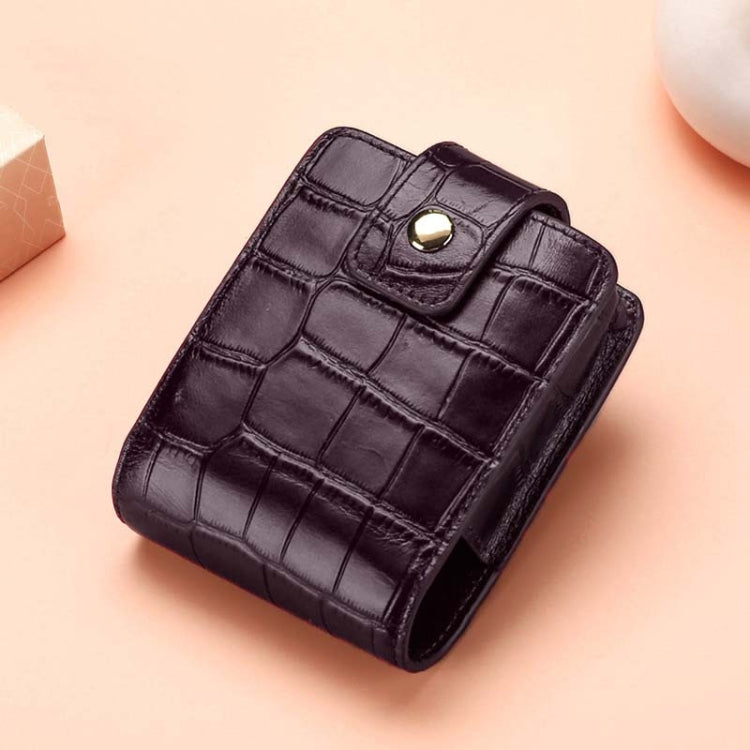 Dark purple croc-pattern lipstick bag with flap and round metal snap closure