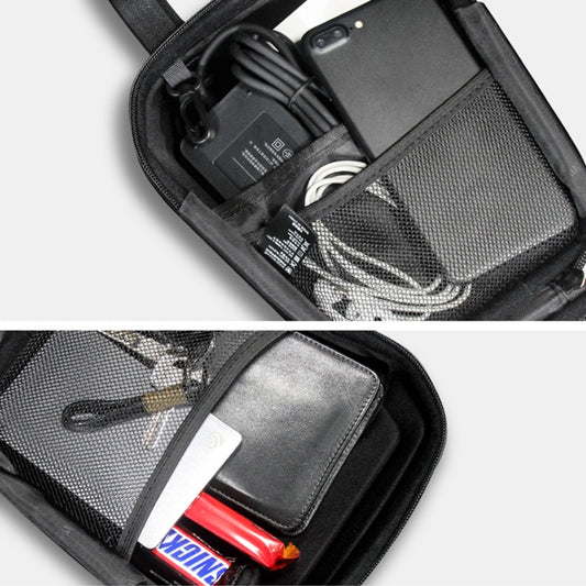 Open hard-shell front bag showing organizer compartments and phone-sized pouch