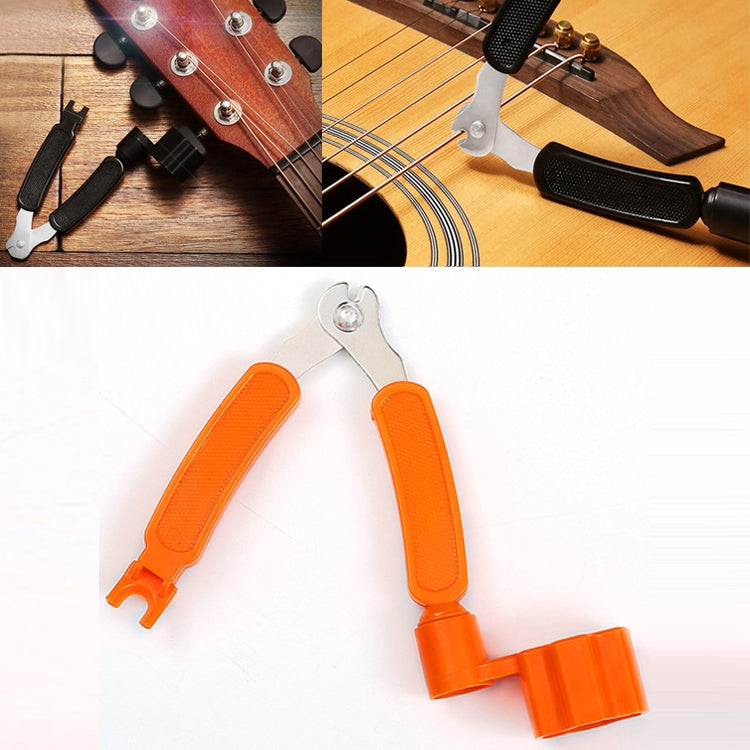 Orange guitar string changing tool set with two clamp handles and bottom cone