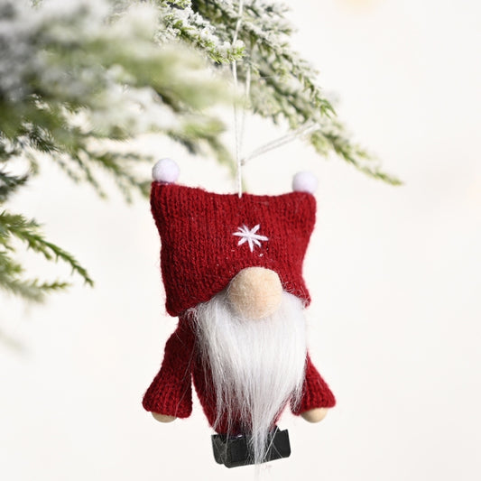 Red knitted gnome ornament with double ball cap, white beard, hanging loop