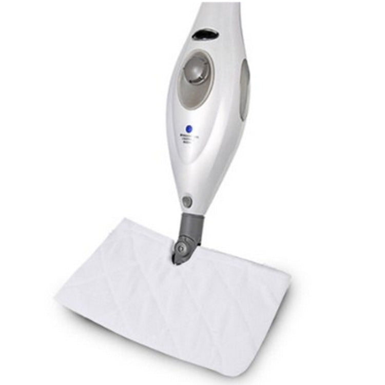 White steam mop pad cover attached to a handheld steam mop