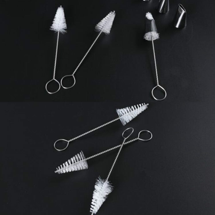 Assorted nozzle cleaning brushes with white nylon bristles on silver wire and ring ends