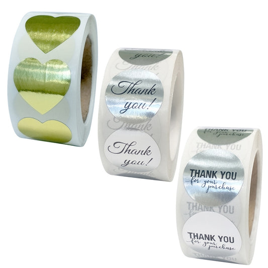Decorative thank-you and heart label stickers on rolls, metallic accents