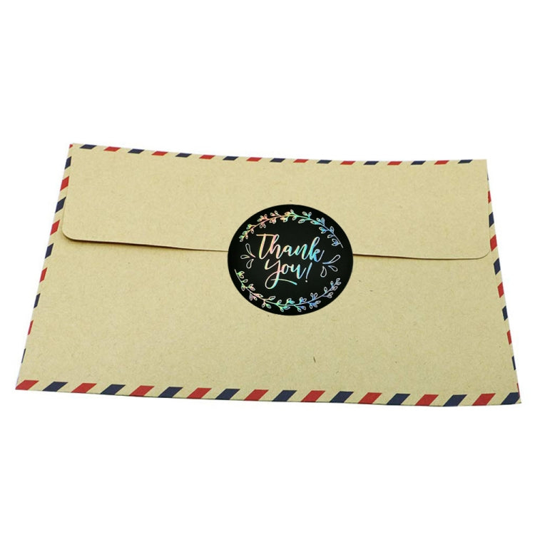 Envelope with round 'Thank you' sticker seal, black design with colorful floral border