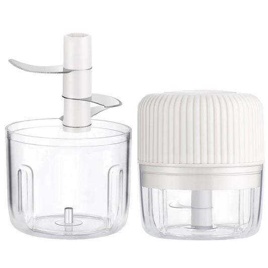 Mini electric food masher set with clear bowl and stainless blade; includes white unit